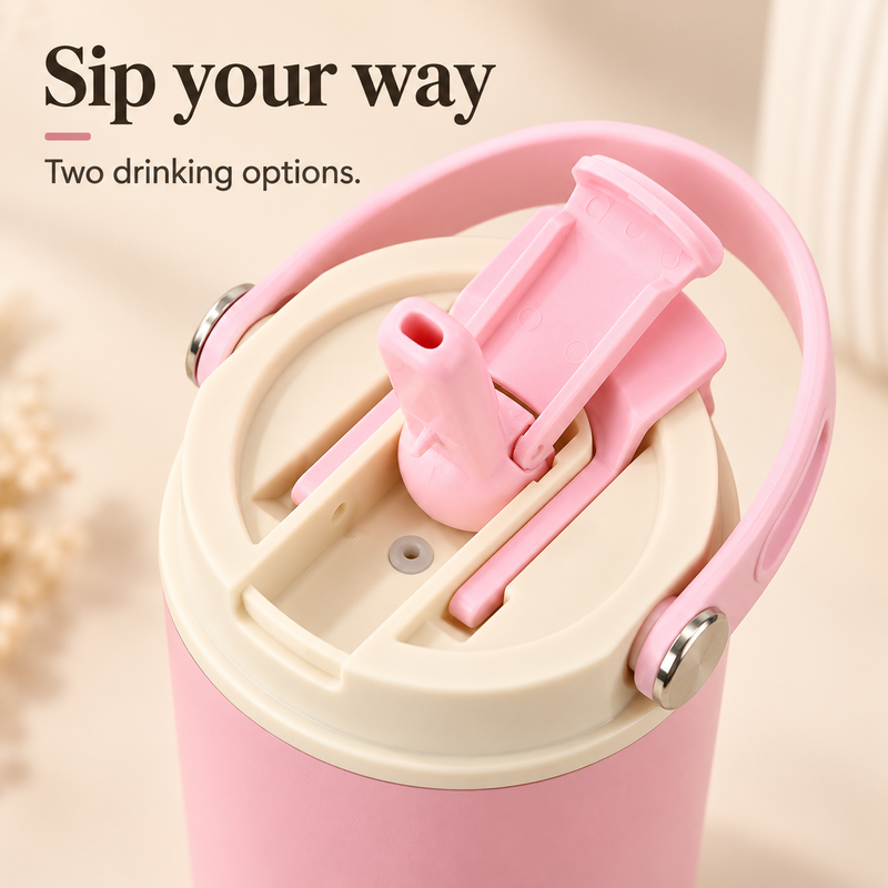 Close-up of the pink tumbler lid with flip-up straw spout and direct-sip opening