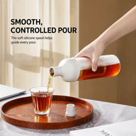 White Yozcoffee 800ml cold brew bottle with a smooth controlled-pour silicone spout