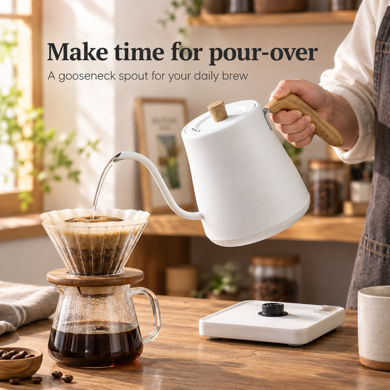 White wood-grain handle gooseneck kettle pouring water into a glass coffee dripper