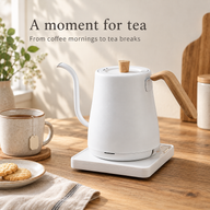 White 800ml electric gooseneck kettle and a mug of tea on a kitchen counter