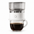 Yozcoffee automatic pour-over coffee maker with light gray transparent tank on a glass cup, white background
