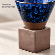 Matte brown ceramic lower cup resting in the separate square base