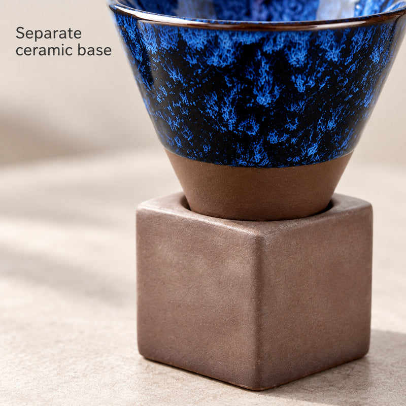 Matte brown ceramic lower cup resting in the separate square base