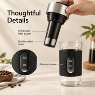 Removable black brewing basket with stainless steel mesh at its lower end beside the ribbed grip glass vessel