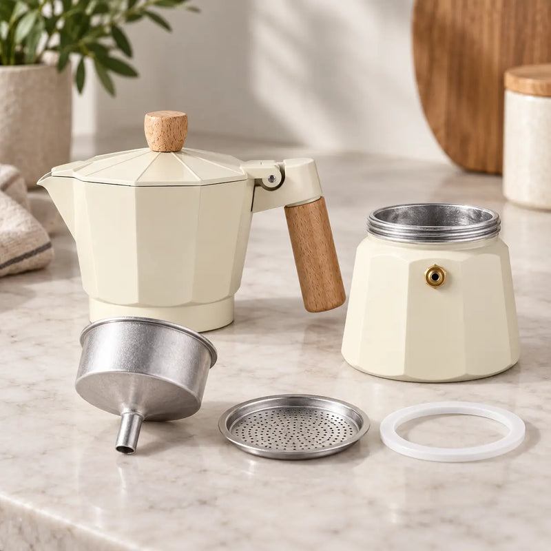 Disassembled moka pot with funnel basket filter plate and sealing ring