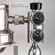Close-up of the dual-gauge CO2 and nitrogen regulator with 16g threaded cartridge connection