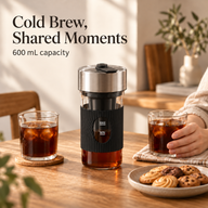 600 mL electric cold brew coffee maker on a home coffee table with two serving glasses