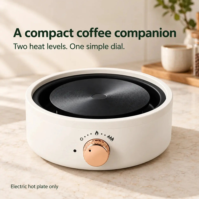 Plaque chauffante électrique compacte blanc ivoire à deux niveaux de chauffe sur un comptoir café