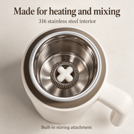 316 stainless steel interior with a circular whisk and white stirring attachment