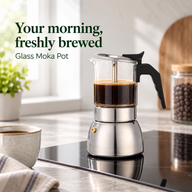 Glass moka pot brewing coffee on a kitchen cooktop