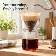 Pouring hot water through a paper filter in the Yozcoffee glass dripper above a 400 ml server
