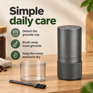 Detached grounds cup and cleaning brush with instructions to keep grinder motor and burrs dry
