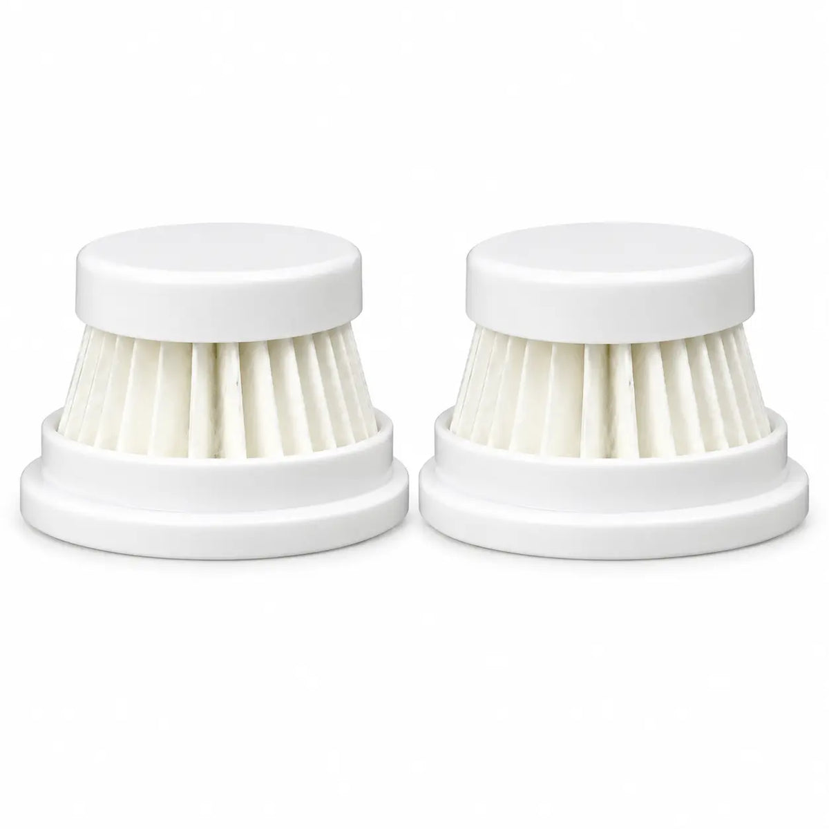 Two white replacement filters for the handheld coffee cleaning vacuum