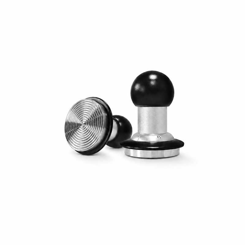 Yozcoffee 58mm impact espresso tamper on white background with black handle and stainless steel base