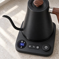 Digital temperature display and controls on the black Yozcoffee electric kettle base