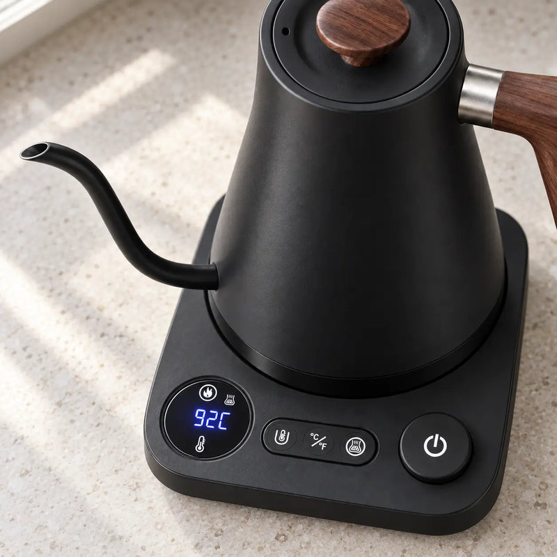 Digital temperature display and controls on the black Yozcoffee electric kettle base
