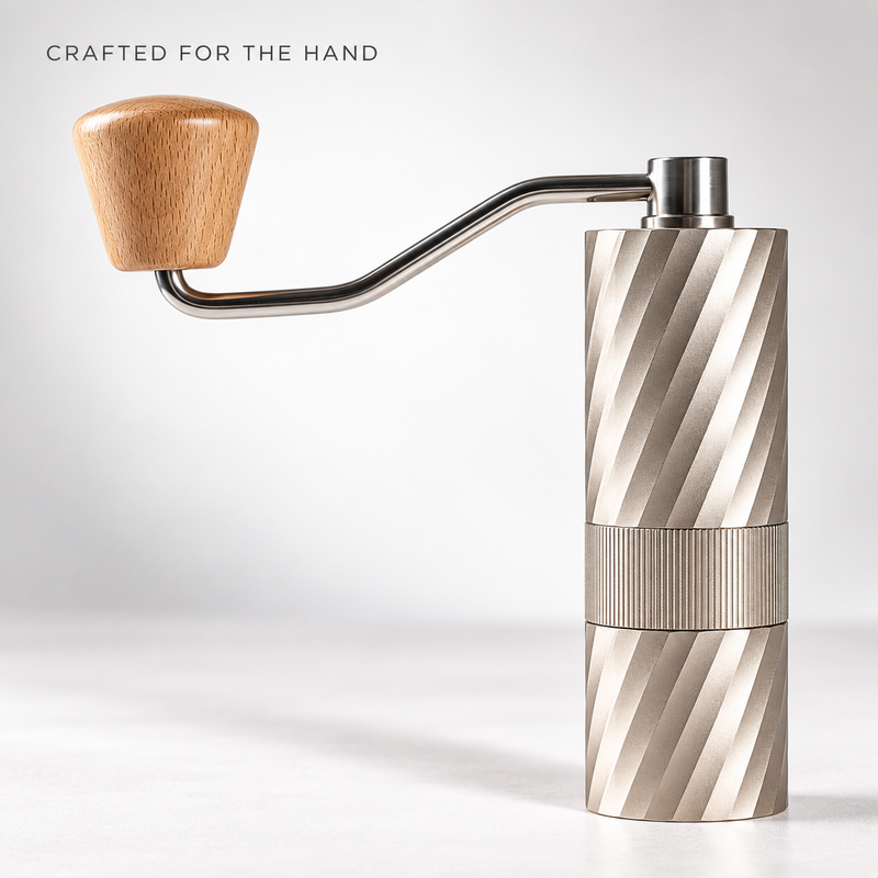 Detail of the Yozcoffee champagne manual grinder wood crank knob and textured center grip