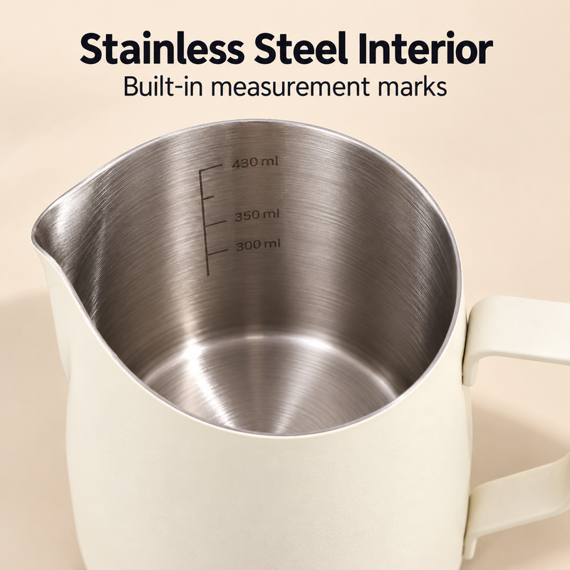 Brushed stainless steel milk pitcher interior with measurement markings