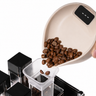 Yozcoffee mini coffee bean scale scoop in beige pouring coffee beans into a grinder hopper