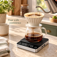 Coffee scale weighing a pour-over brewer and glass carafe