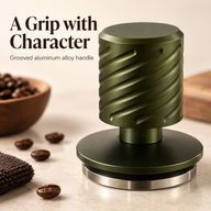 Close-up of the diagonal grooves on the dark olive green aluminum alloy tamper handle