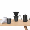 Yozcoffee portable pour over coffee maker set displayed on a wooden table with kettle dripper and mug