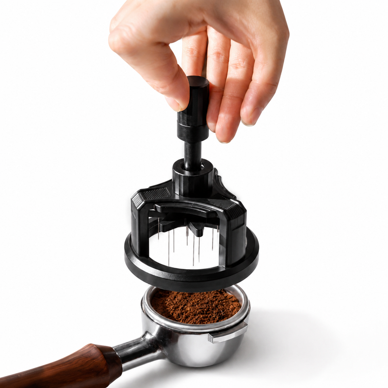Yozcoffee rotating espresso WDT distributor in black breaking up grounds over a portafilter