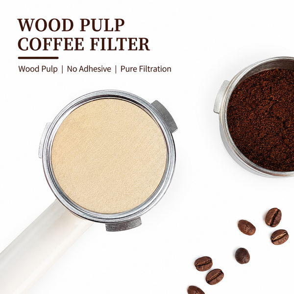 Alternate view of Top view of a round wood pulp coffee filter fitted in a portafilter beside ground coffee and beans
