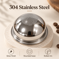 Inverted silver 304 stainless steel espresso basket showing its rounded base and rolled rim