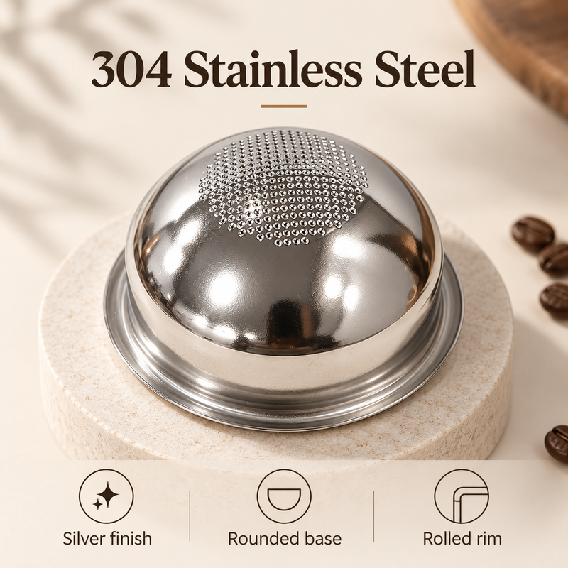 Inverted silver 304 stainless steel espresso basket showing its rounded base and rolled rim