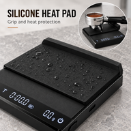 Silicone heat pad and portafilter support on black coffee scale