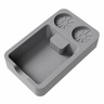 Overhead view of the gray silicone tamping mat with a deep tray, center rest, and two round tool holders