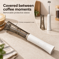 Removable smoky transparent protective sleeve fitted over the white milk frother shaft