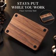 Underside of walnut espresso tamping station showing four black nonslip feet