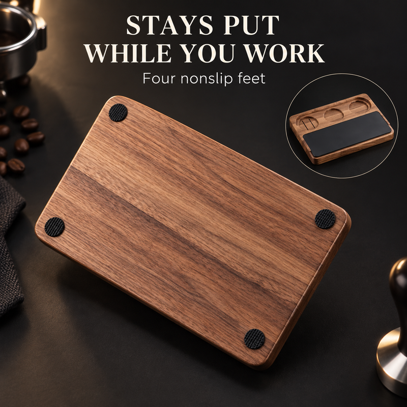 Underside of walnut espresso tamping station showing four black nonslip feet