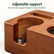 Close-up of the adjustable metal support screw in the wooden portafilter cradle